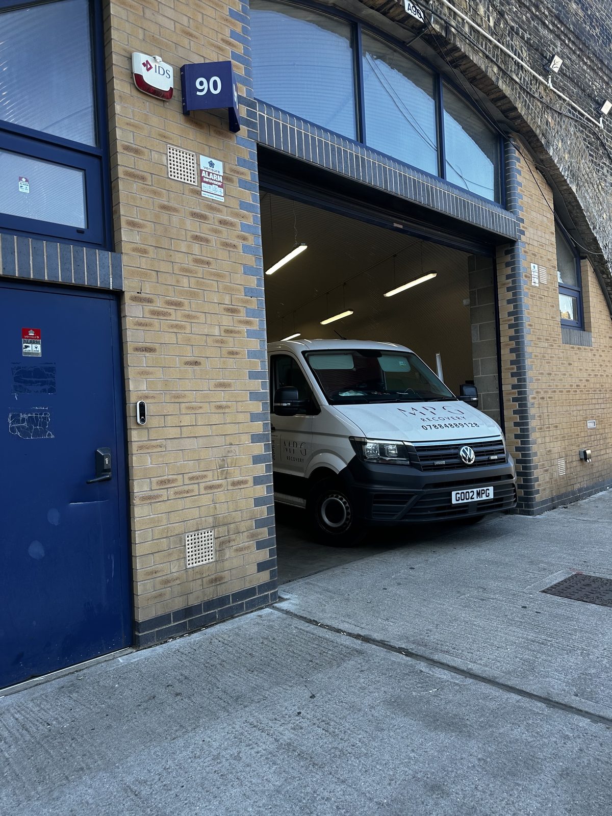 The MPG Recovery van reversed into the arch doorway at the London base